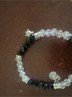 Crystal and Black Bead Stretch Bracelet with Silver Shell Charm